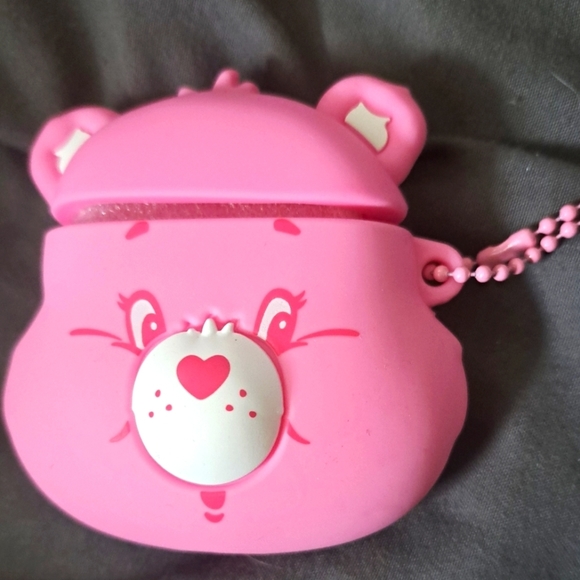 NWT Carebear 40th anniversary edition earbud holder.